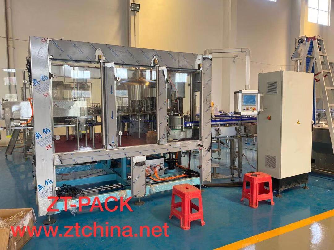Machine de coiffage de remplissage de rinçage rotatif - Type de gravité